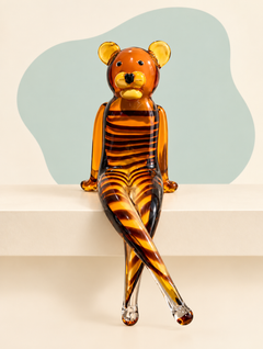 Seated amber stripe glass bear sculpture — front view