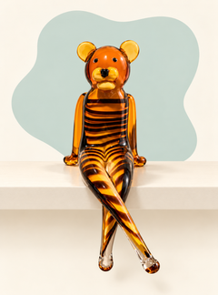 Seated amber stripe glass bear sculpture — side view