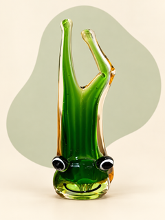 Green and amber glass frog sculpture — side view