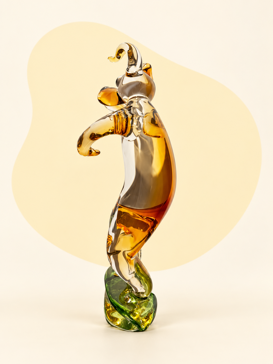 Amber and clear glass dog sculpture — angle view