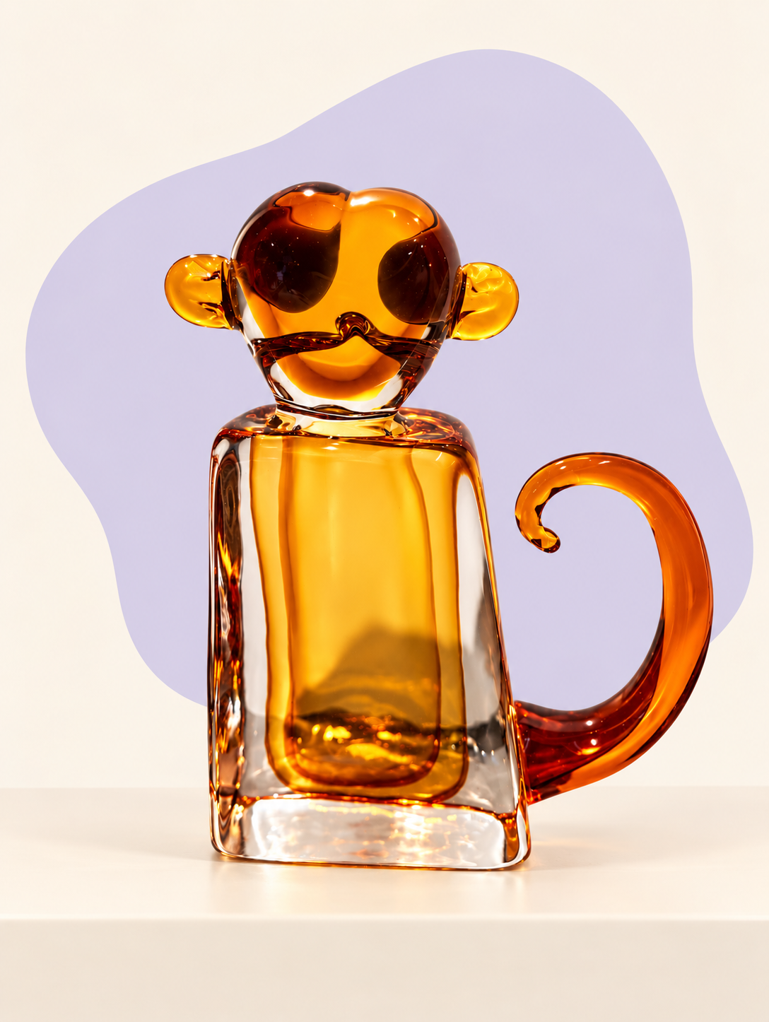 Amber glass monkey sculpture rear view