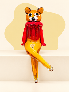 Seated glass fox sculpture angle view