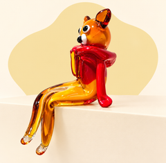 Seated glass fox sculpture side view