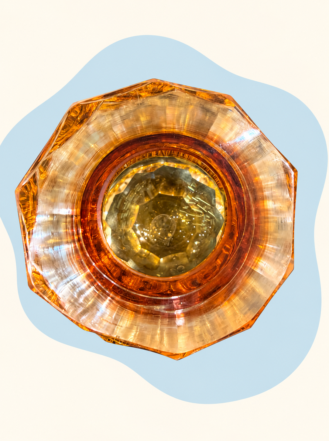 Amber faceted crystal vessel — top view