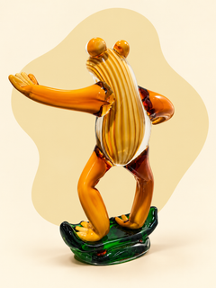 Glass frog on skateboard sculpture — rear view