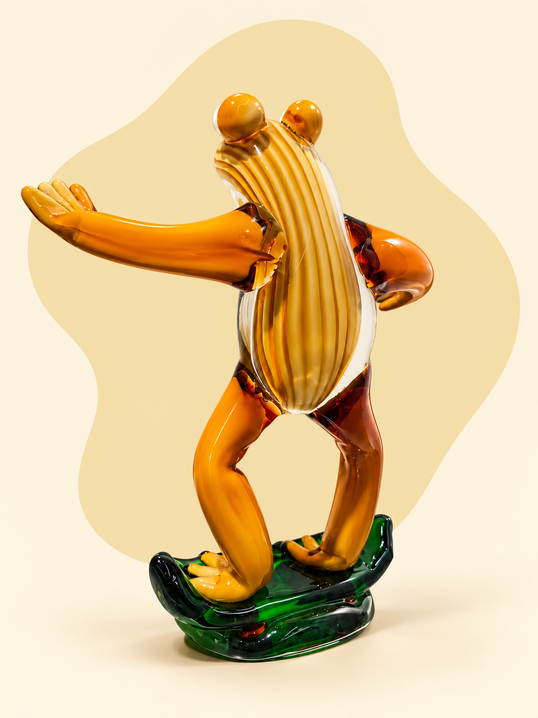 Glass frog on skateboard sculpture — rear view